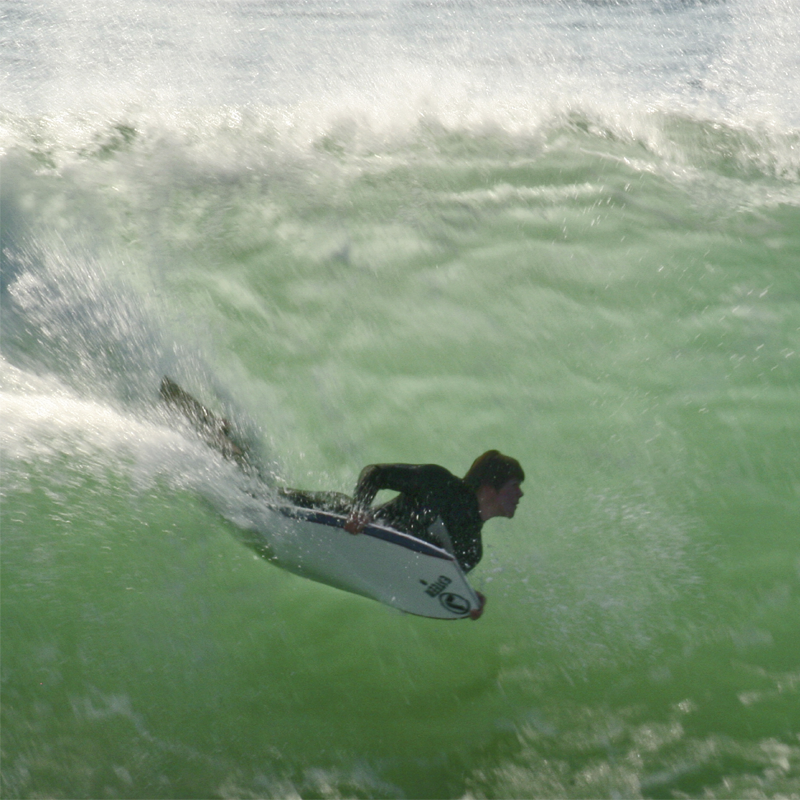 pismo beach surfing, flying on the wave 